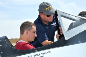 James Martin familiarizes Mr. Mark Harding with the PT-19 just prior to taking off.