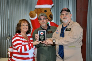 Gena Linebarger presents the First Place Award to Brent Collins and Paul "Buffy" Cooper.
