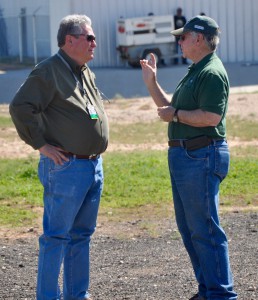 Members Mike Hedrick and Robin Donnelly discuss the finer points of county government...or the oil business...or the landing characteristics of a Cessna 195...or whatever.  They were just two of the many members who took advantage of the great weather to join in on Member Ride Day on Saturday.